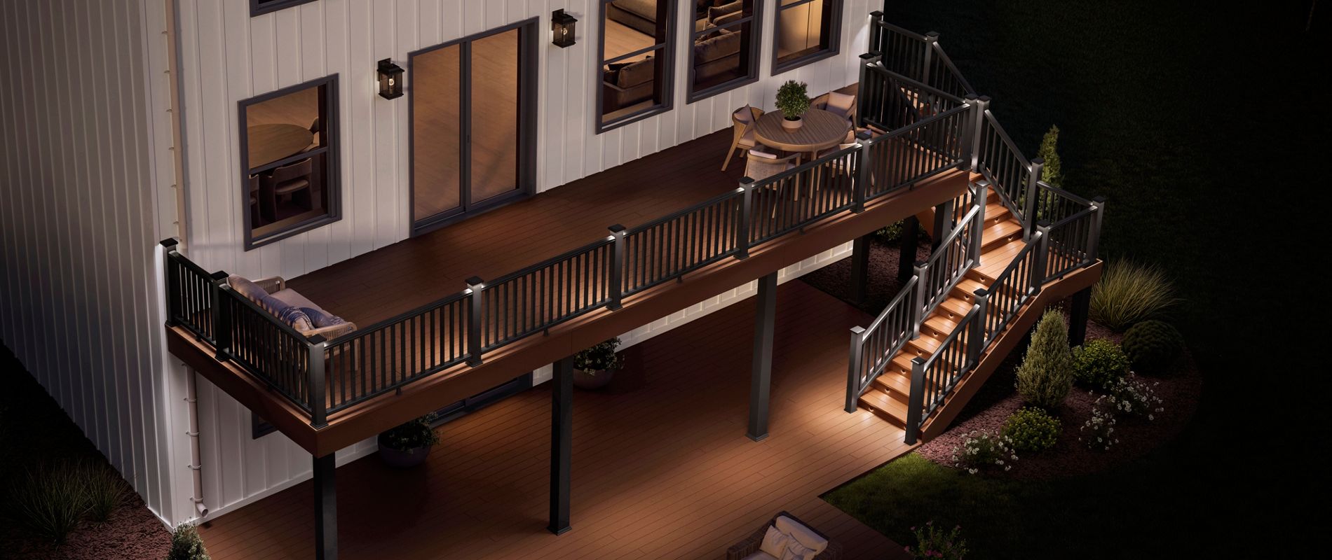 Aerial overview of a Trex Deck lit up at night